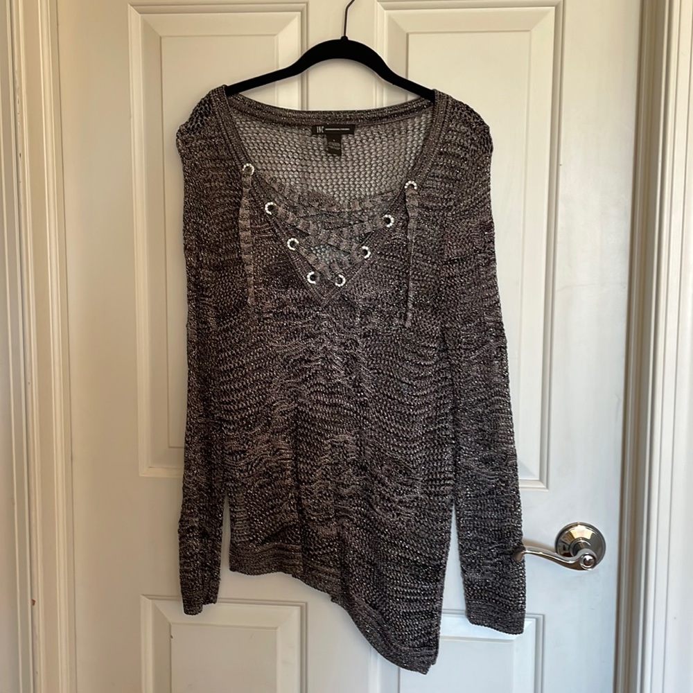 INC asymmetrical hem line glittery lace up sweater.
